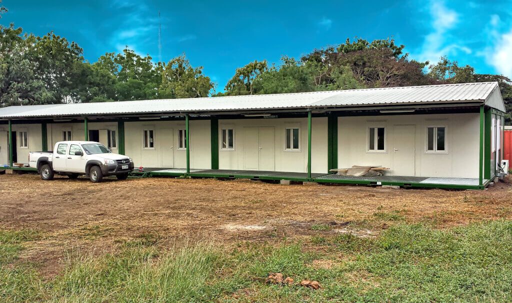 papua new guinea - accommodation camp made of flat packs