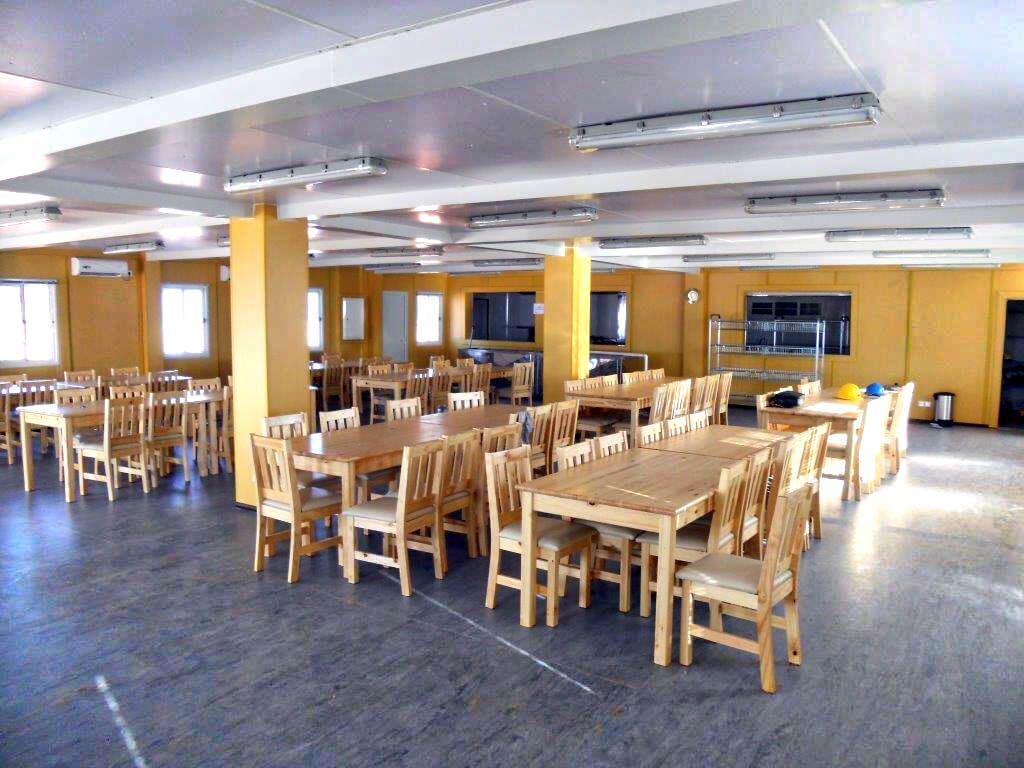 south africa - open space cafeteria made of flat-pack cabins joined